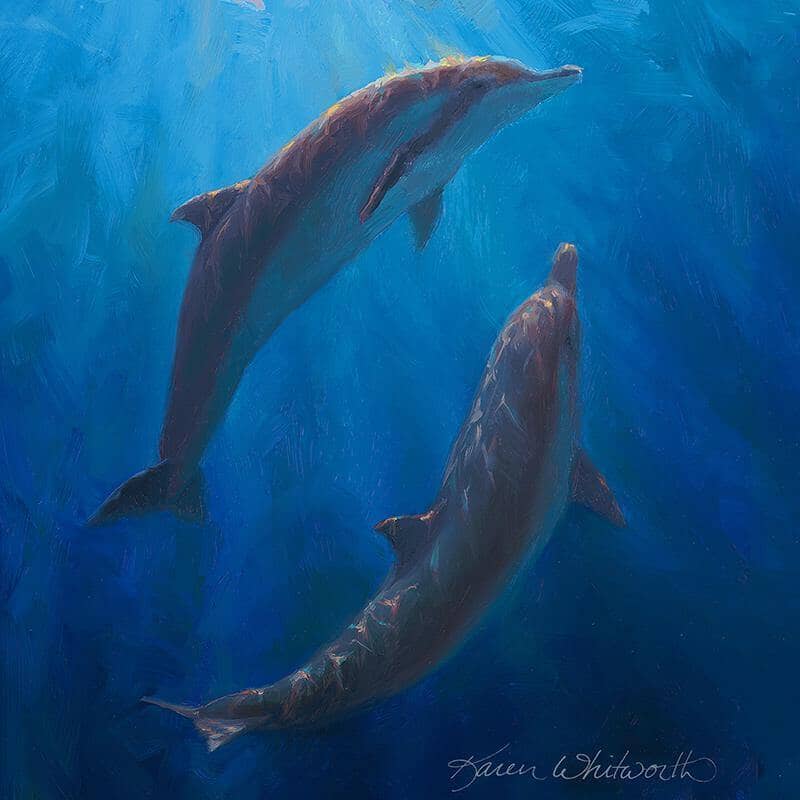 Underwater art painting of two dolphins swimming under the waves and surrounded by beautiful deep blue ocean.