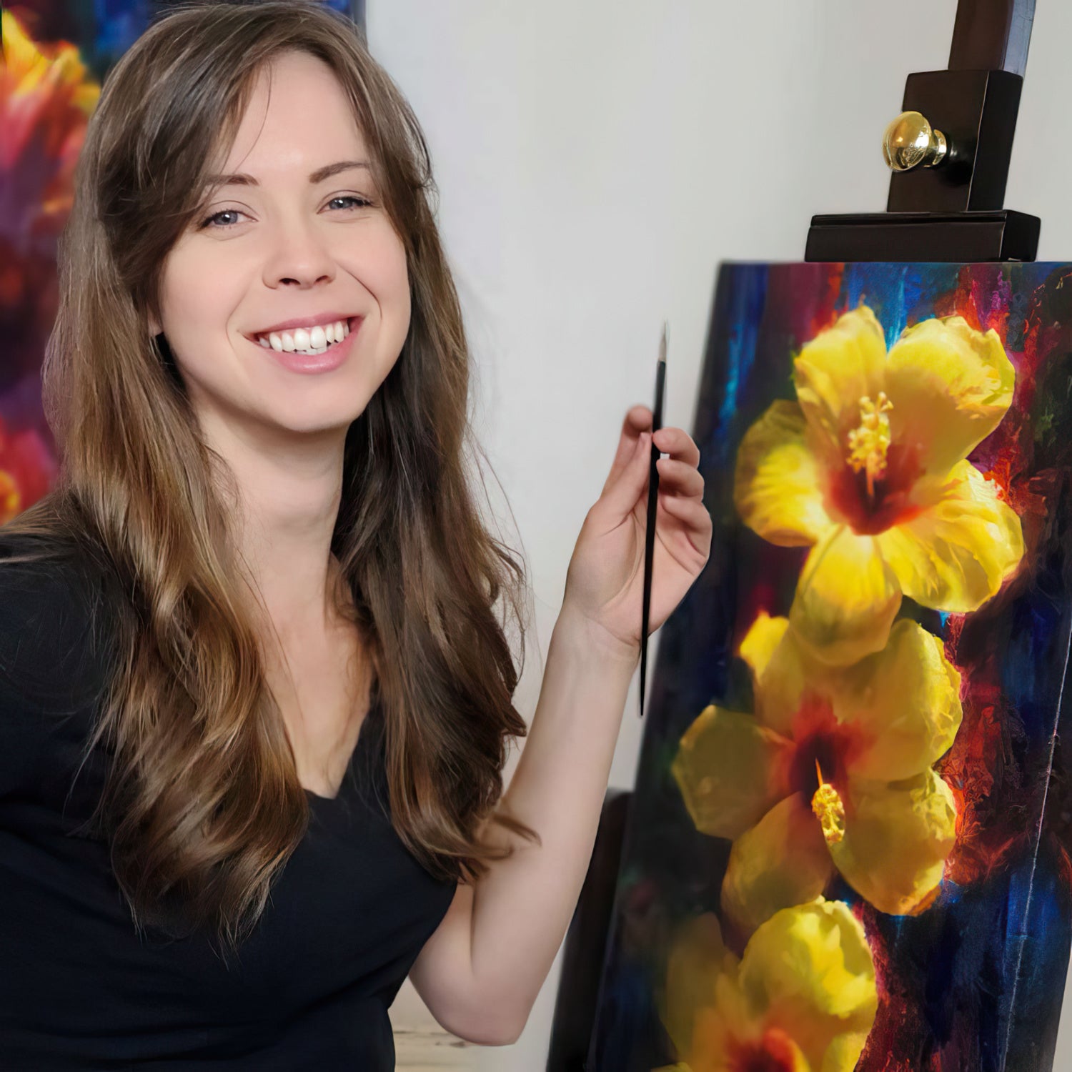 Photo of Hawaii artist Karen Whitworth in front of the Hibiscus Painting "Past Present Future". The painting depicts 3 blooming yellow hibiscus flowers.