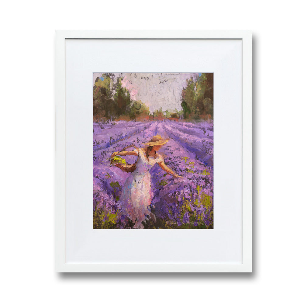 Lavender field wall art of woman picking lavender in a blooming flower field. The rows of lavender fade into the distance of this soft landscape painting. The artwork is framed in a white wood picture frame and is hanging on a white wall.