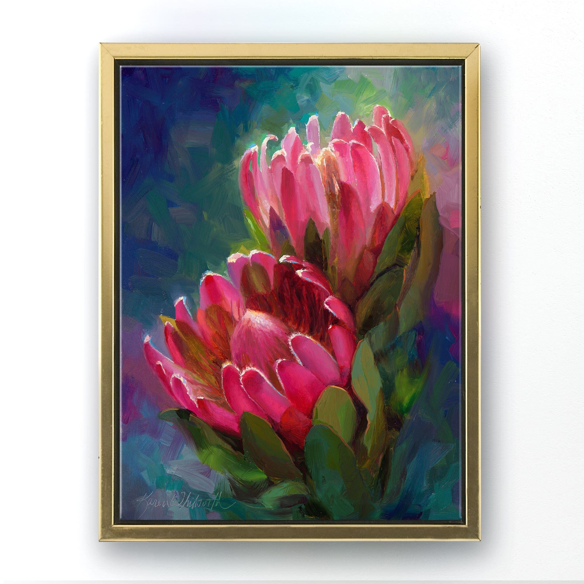 Protea canvas art of tropical pink flowers by floral artist Karen Whitworth. The artwork is framed in a gold floater frame and is  hanging on a white wall.