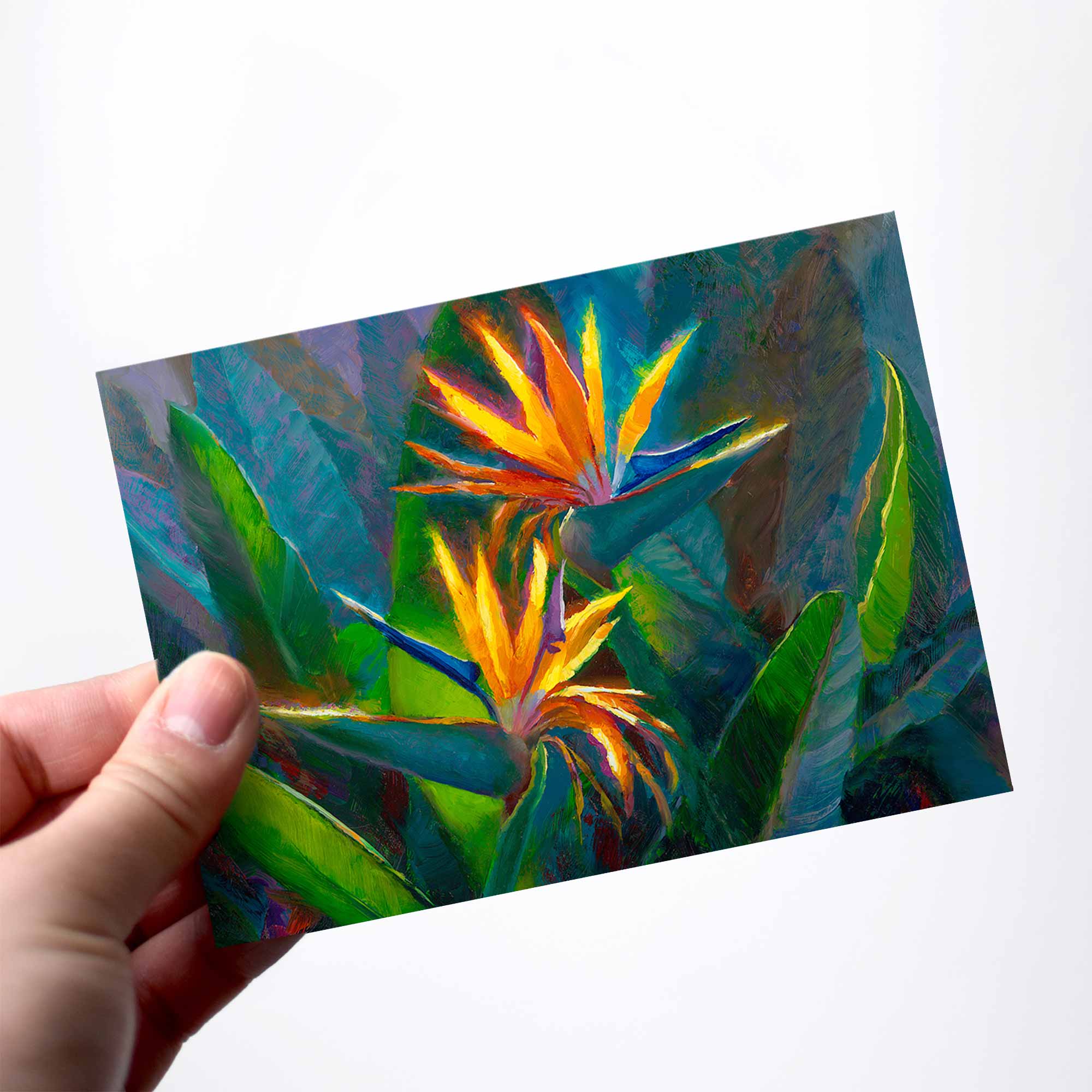 Bird of paradise flowers on a greeting card with white envelope