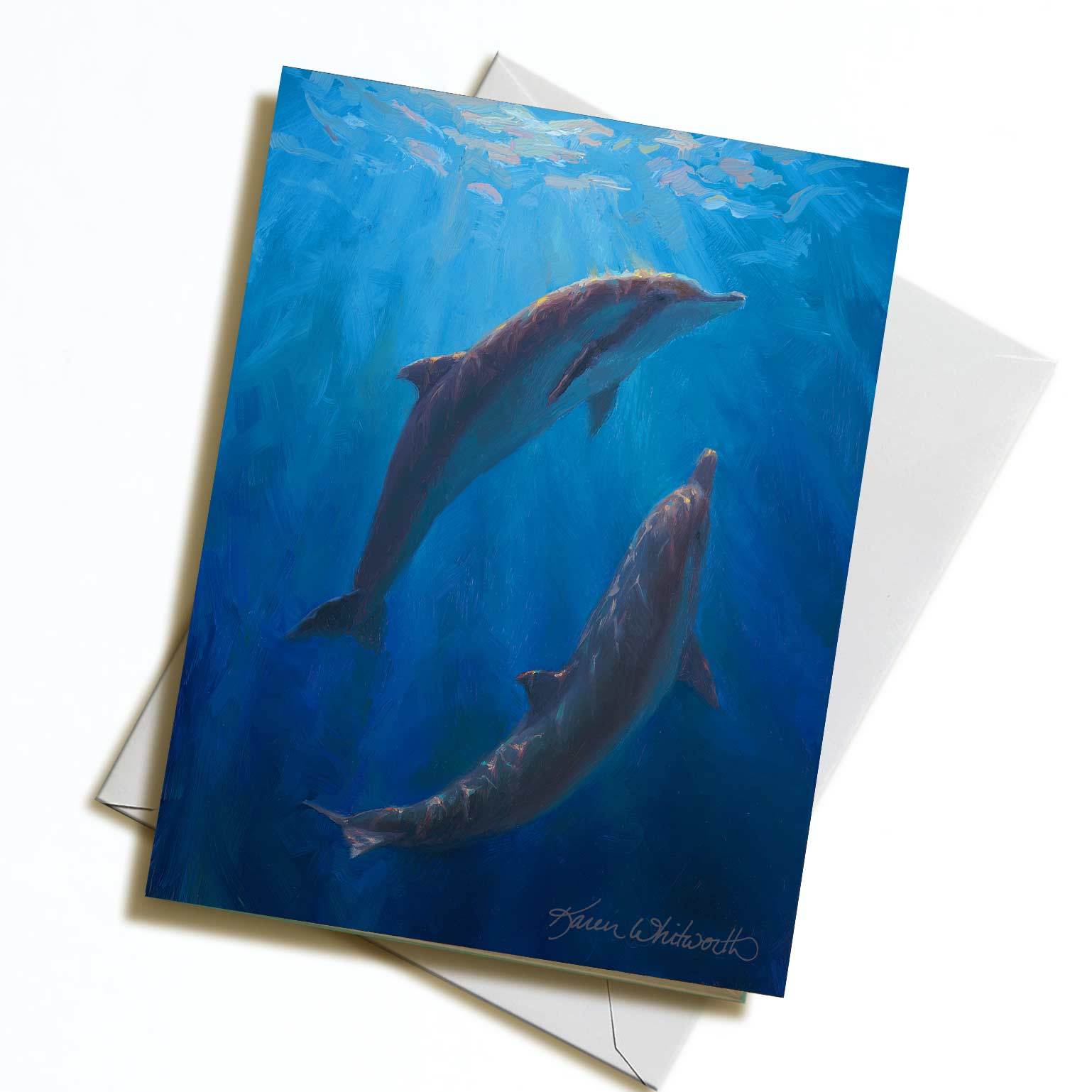 Dolphin Dance greeting card with deep blue ocean colors by Alaska artist Karen Whitworth