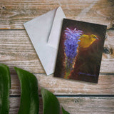 Hawaii note card featuring painting of Amakihi Bird and Haleakala Lobelia Flower against a wood background