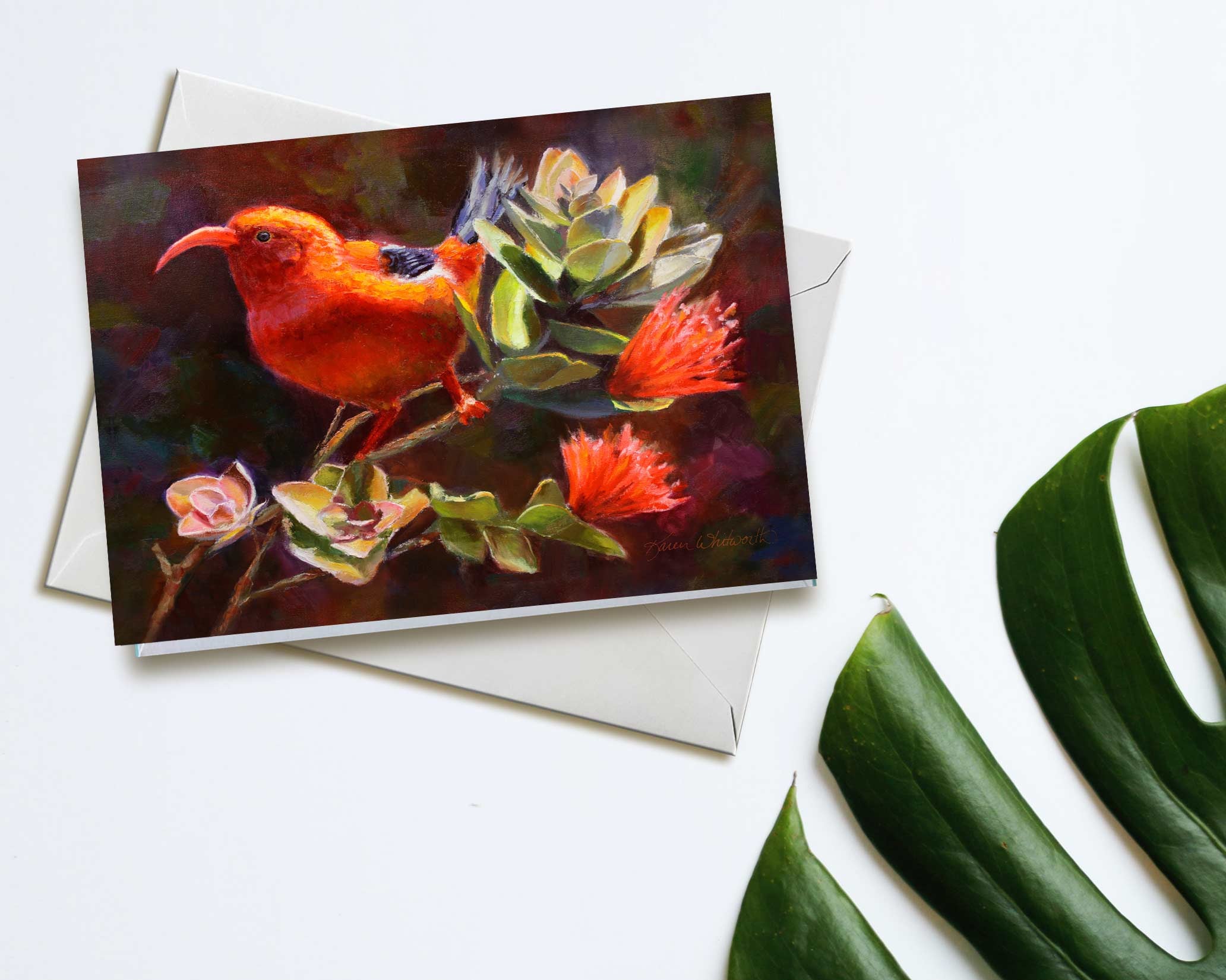 Hawaii note card featuring painting of Iiwi Bird and Ohia Lehua Flower against a white background