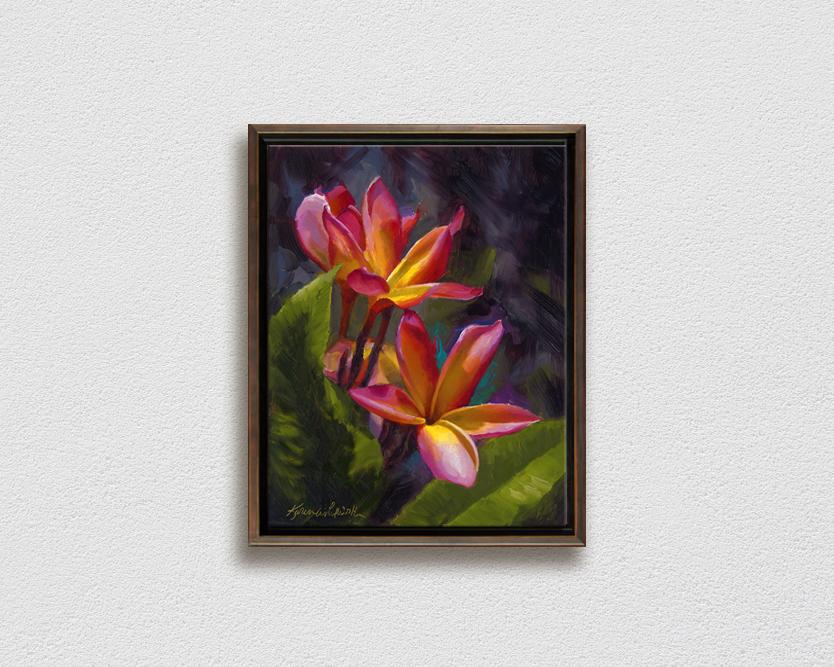 Framed wall art canvas of tropical Hawaiian Plumeria flower blossoms on a white wall