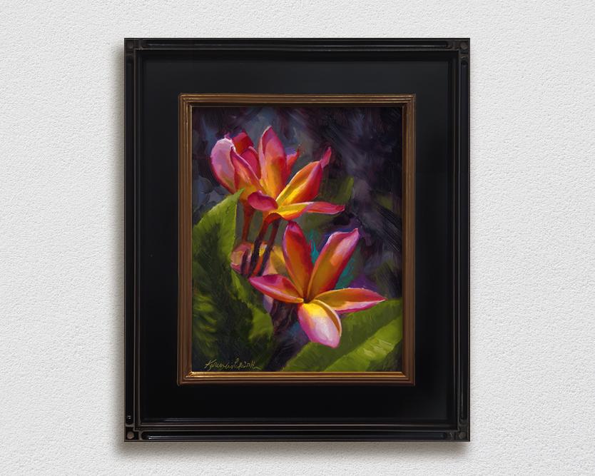 Framed wall art canvas of tropical Hawaiian Plumeria flower blossoms on a white wall