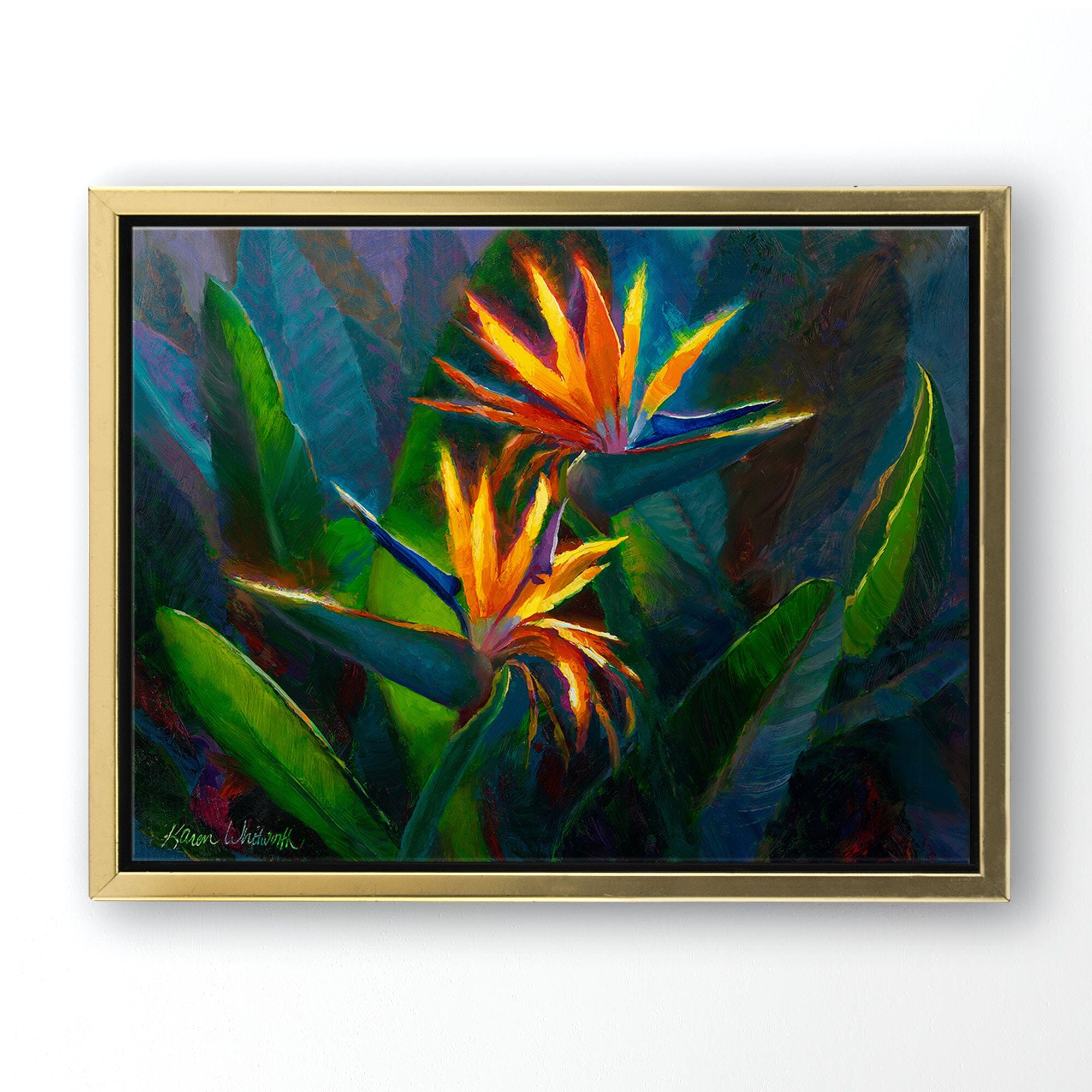 Hawaiian Flower Painting with tropical bird of paradise canvas art print by Hawaii artist Karen Whitworth. The artwork is framed in a Gold float frame and hanging on a white wall. 