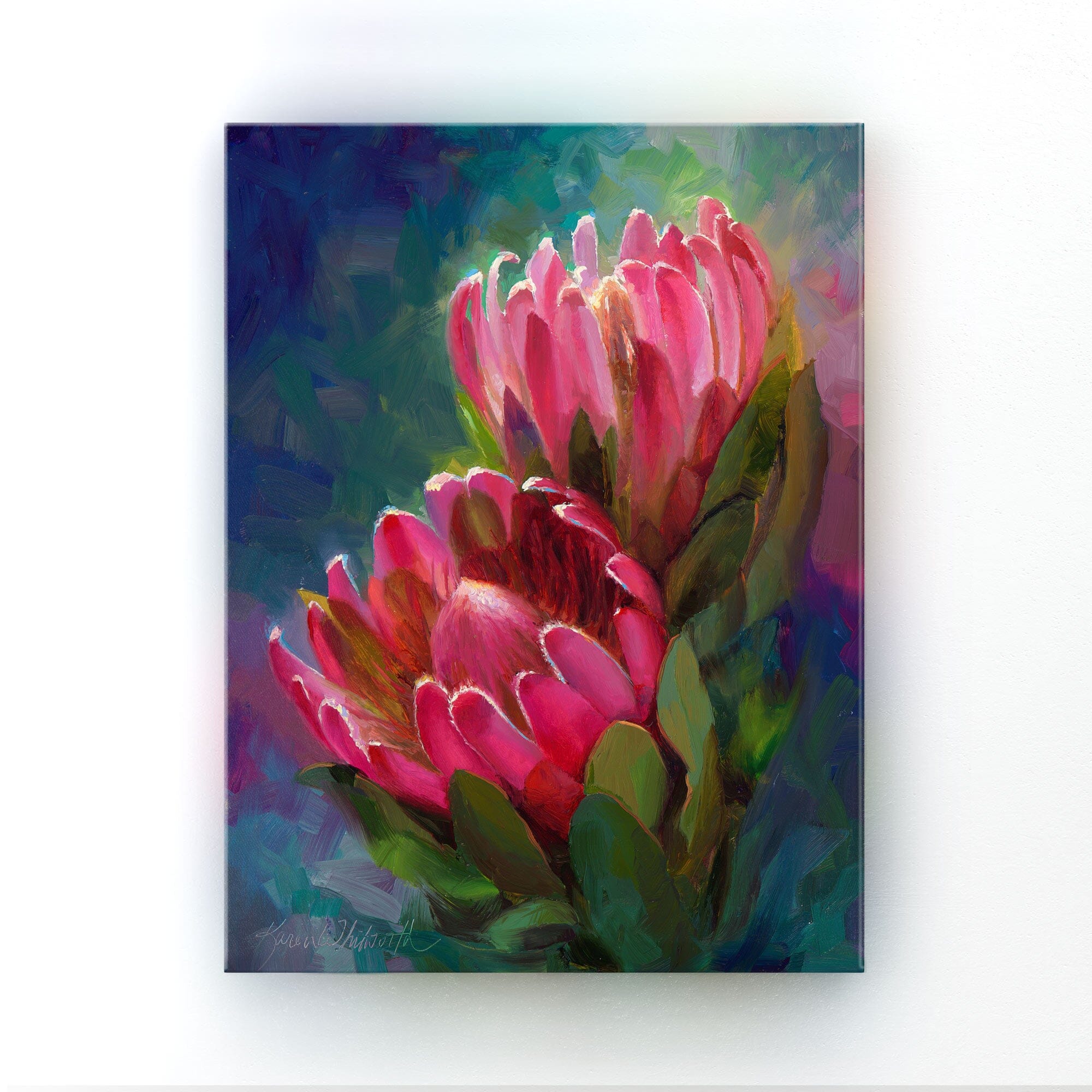Protea canvas art of tropical pink flowers by floral artist Karen Whitworth. The artwork is hanging on a white wall. 