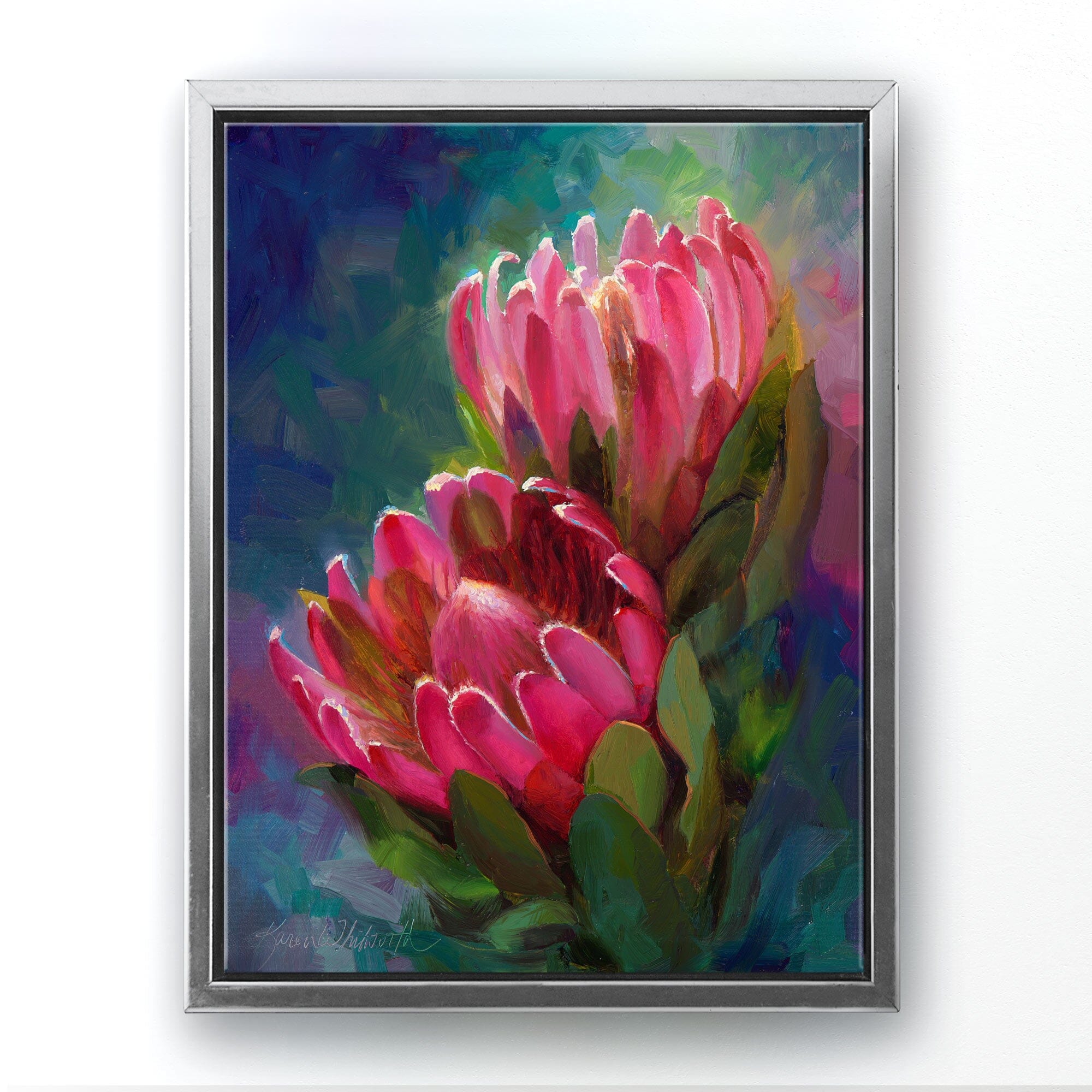 Protea canvas art of tropical pink flowers by floral artist Karen Whitworth. The artwork is framed in a silver floater frame and is hanging on a white wall. 