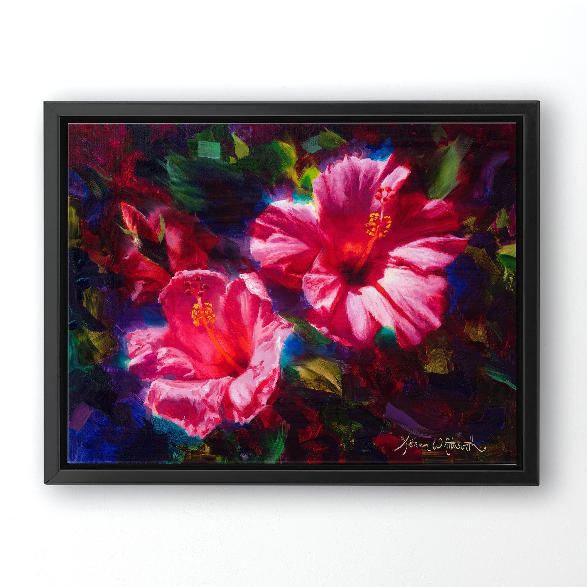 pink hibiscus Hawaiian flower painting on canvas by Hawaii artist Karen Whitworth. The artwork is framed in a black frame and hanging on a white wall.