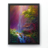 Landscape painting on canvas of Hawaiian waterfall by tropical artist Karen Whitworth titled "Healing Retreat". The canvas wall art is framed in a black frame and is hanging on a white wall.