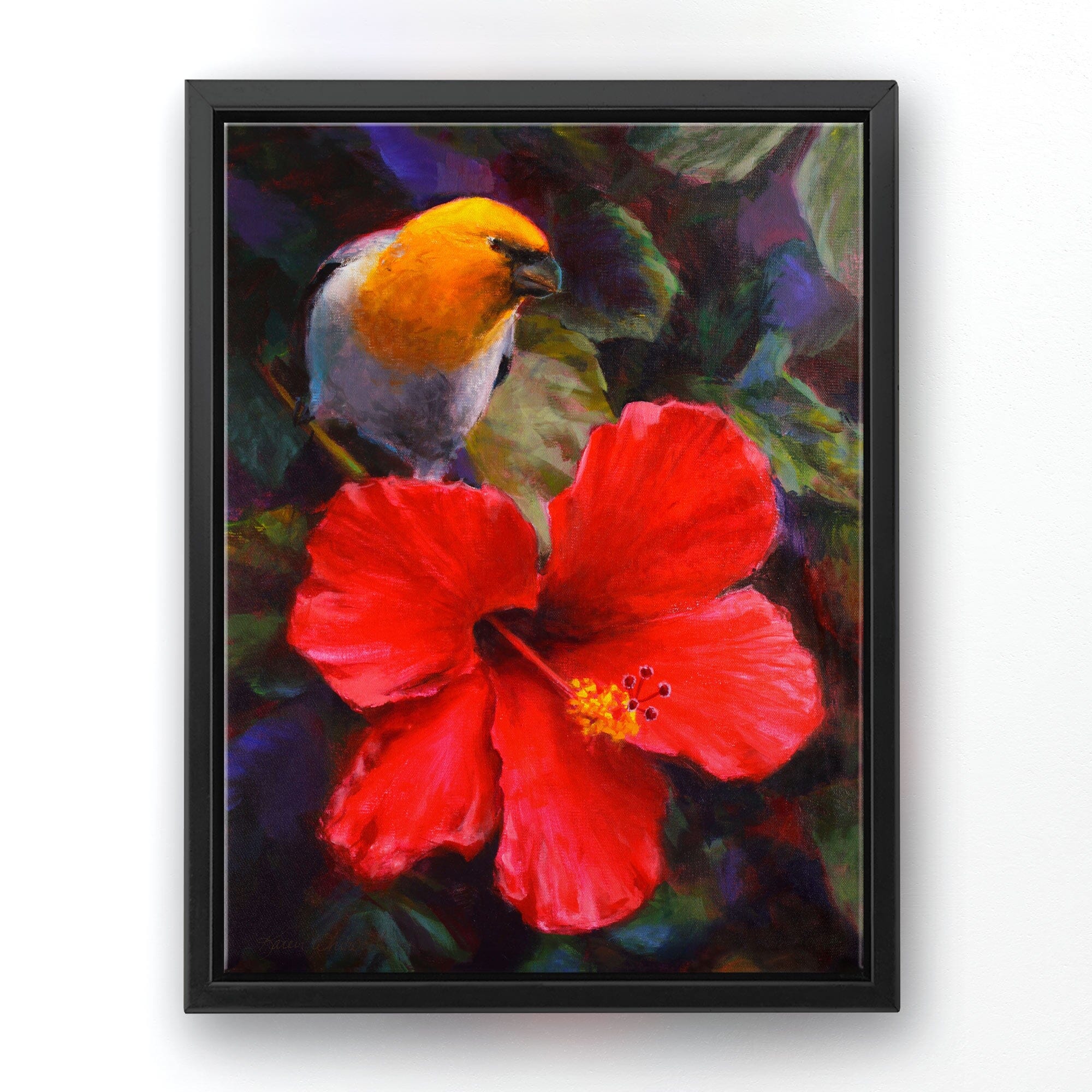 Tropical canvas art of Native Hawaiian Koki'o 'ula Hibiscus flower and and Palila bird by artist Karen Whitworth. The artwork is framed in a black floater frame and is hanging on a white wall.