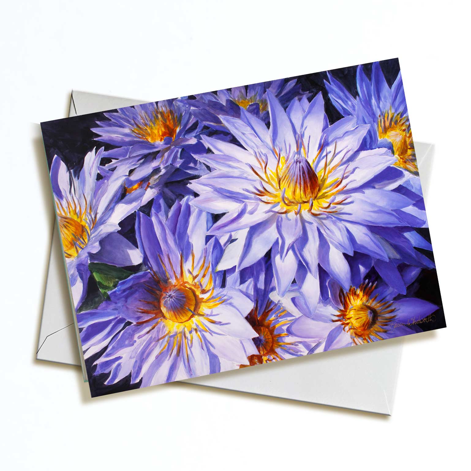An envelope and card featuring art of tropical Hawaiian Purple Lotus Flowers on white background