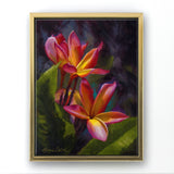 Tropical plumeria canvas art of Hawaii floral painting by artist Karen Whitworth. The canvas is framed in a gold floater frame and is hanging on a white wall.
