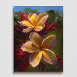 Wall art canvas of tropical Hawaiian Plumeria flowers painting by Hawaii artist Karen Whitworth on white wall