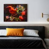 Wall art canvas of Hawaiian Iiwi bird on an Ohia Lehua tree. Painting by Tropical Artist Karen Whitworth. Painting is on a white wall with a bed and nightstand below it.